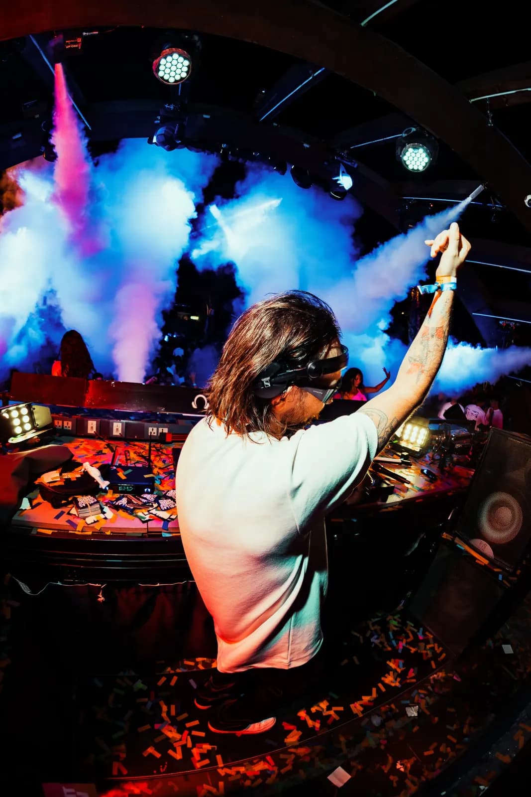 DJ playing reggaeton at Move it! Malta with CO2 jets behind the booth